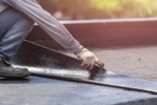 Professional Basement Waterproofing technician working in Mendon, NY